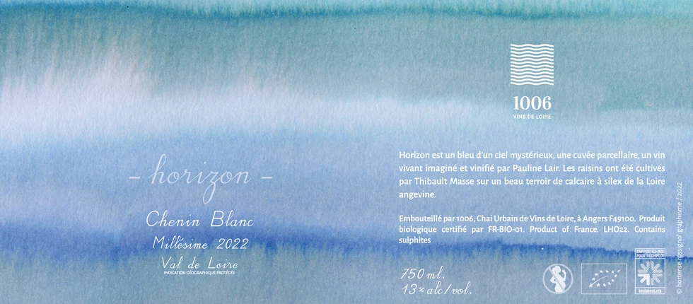 etiquette de vin avec peinture bleue et texte