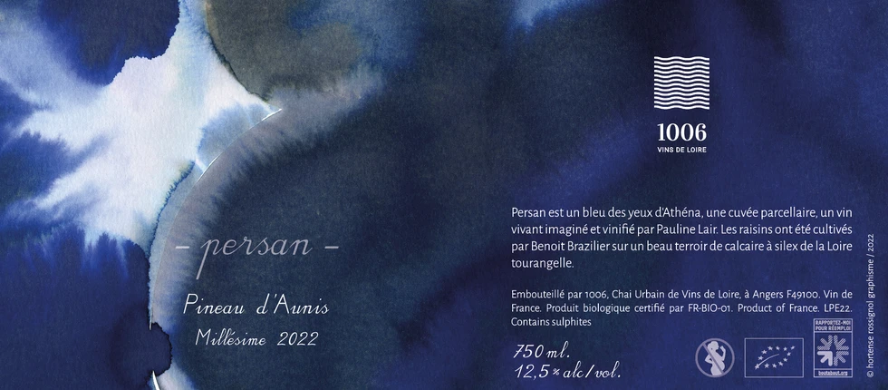 etiquette de vin avec peinture bleue et texte