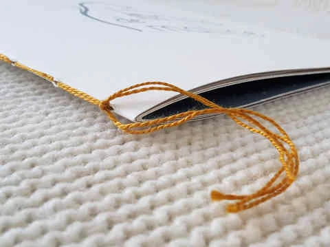 bochure d'exception reliée main